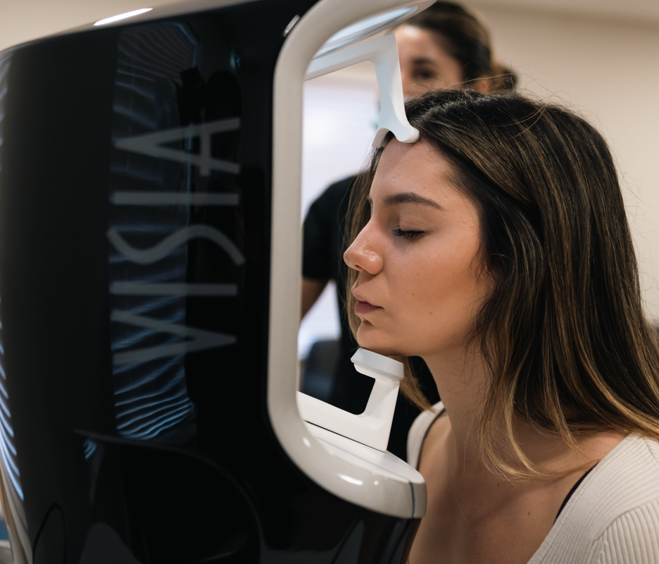 client using the VISIA skin analysis machine